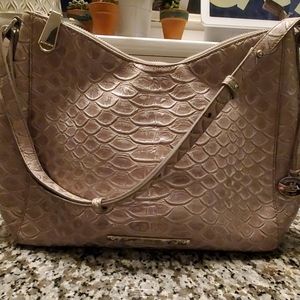 Brahmin shoulder purse, gray, pearly in color.